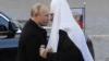 Президент России Владимир Путин (слева) и Московский патриарх Кирилл.  Москва, 4 ноября 2018 года