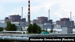 Крупнейшая в Европе Запорожская атомная электростанция (ЗАЭС) у города Энергодар Запорожской области.  На оккупированной Россией территории Украины, 4 августа 2022 года