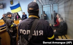 Суд над российскими военнопленными в Украине.
