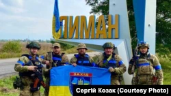 Украинские военные батальона Национальной полиции «Запад» после освобождения города Лиман в Донецкой области от российской армии.  3 октября 2022