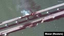 Взрыв и пожар на Крымском мосту со спутника, 8 октября 2022 года