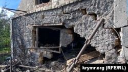 Разрушенный от взрыва сарай в Херсонской области
