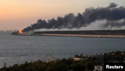 Пожар после взрыва на Керченском мосту, Крым, 8 октября 2022 года