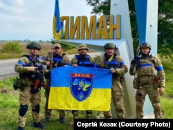 Бойцы батальона Национальной полиции Украины «Запад» после освобождения города Лимана от российской армии.  Донецкая область, 2 октября 2022 года